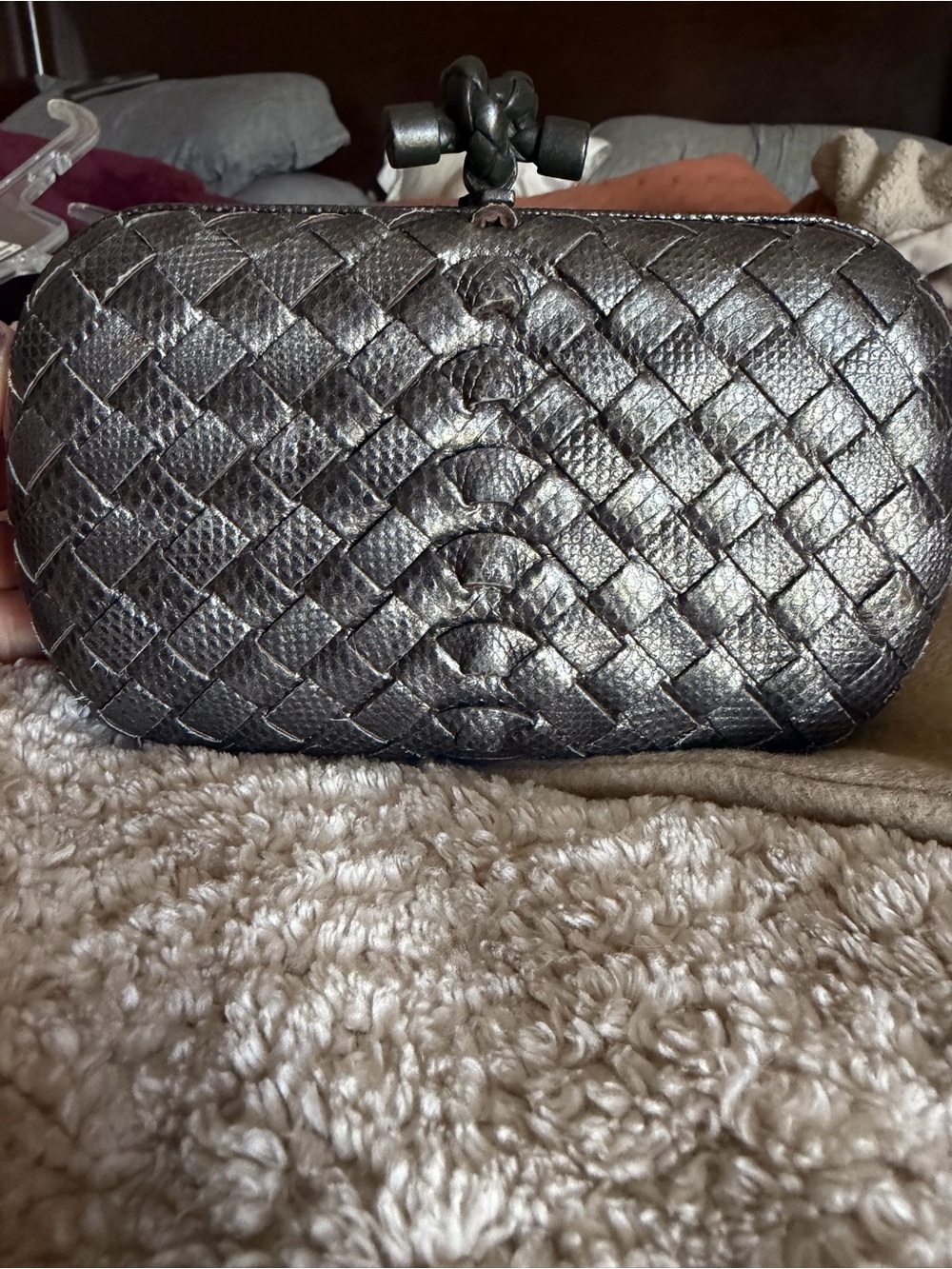 Woven Leather pouchette clutch with knot in steel leather. No wear or tear.